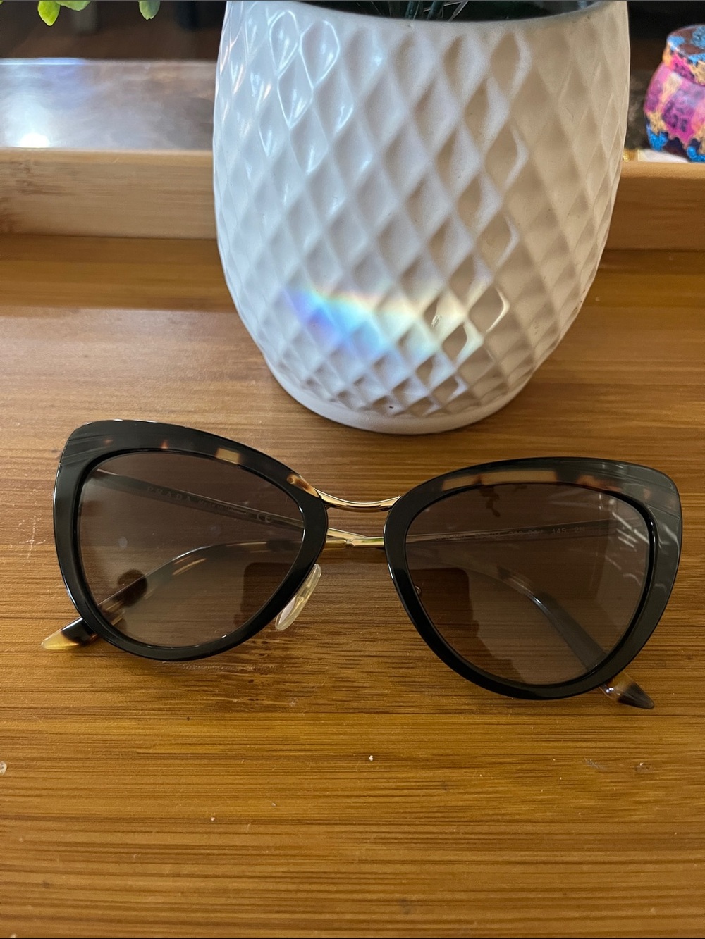 Prada Black & Tortoiseshell Cat-Eye Sunglasses with Gold Trim